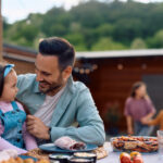 Attachment for Wayfair's tiny table solution might help people eat al fresco on their small patios